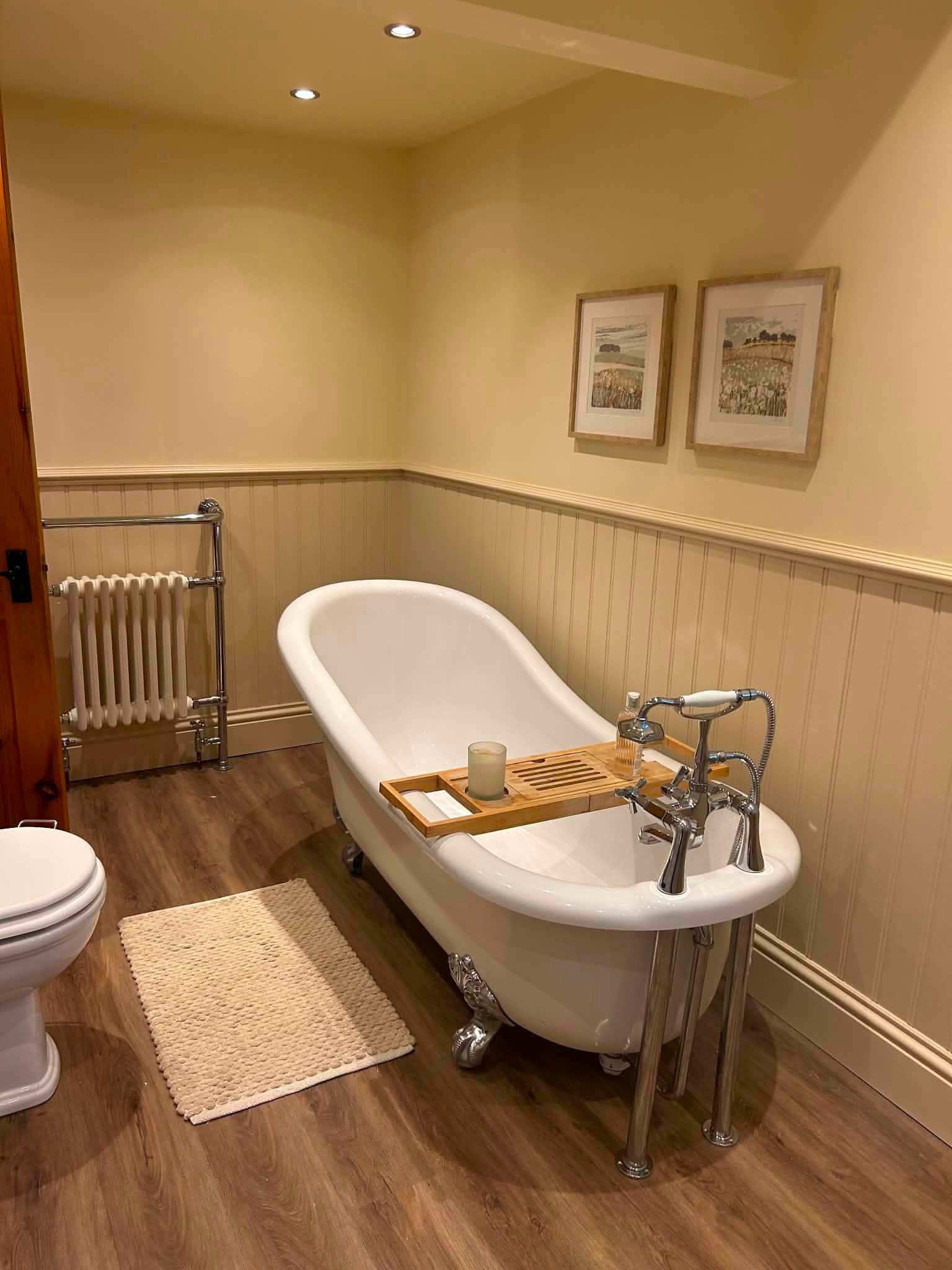 Customer bathroom installation — freestanding roll-top slipper bath